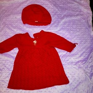 Red dress and matching hat.